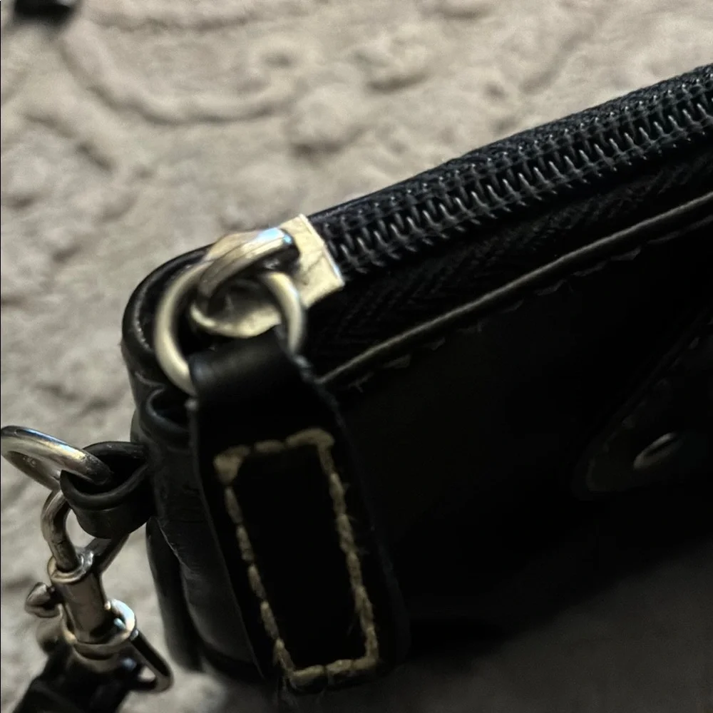 Elegant Black Clutch Wristlet with Silver Accents